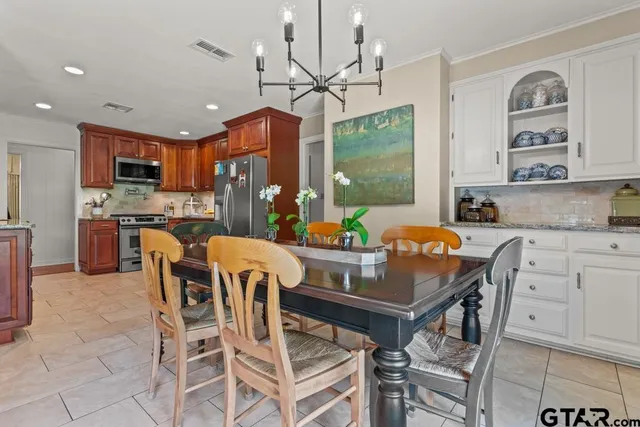 a view of kitchen with cabinets and wooden floor