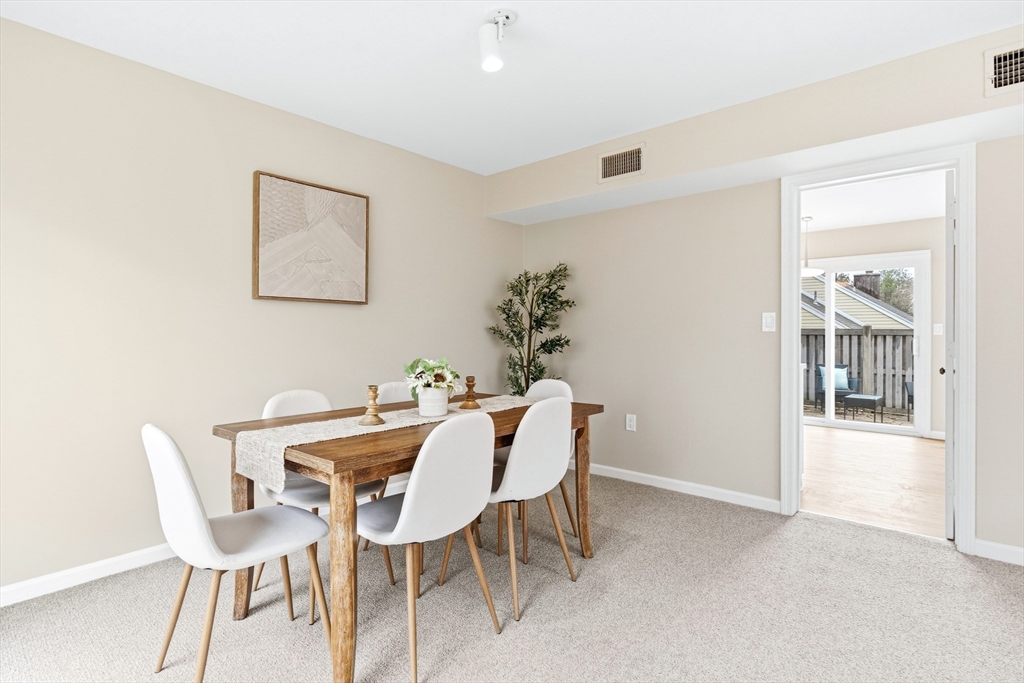 4 Drummer Boy Way, Unit 4 Lexington, MA 02420 - Photo 12 of 37 a dining room with furniture and window