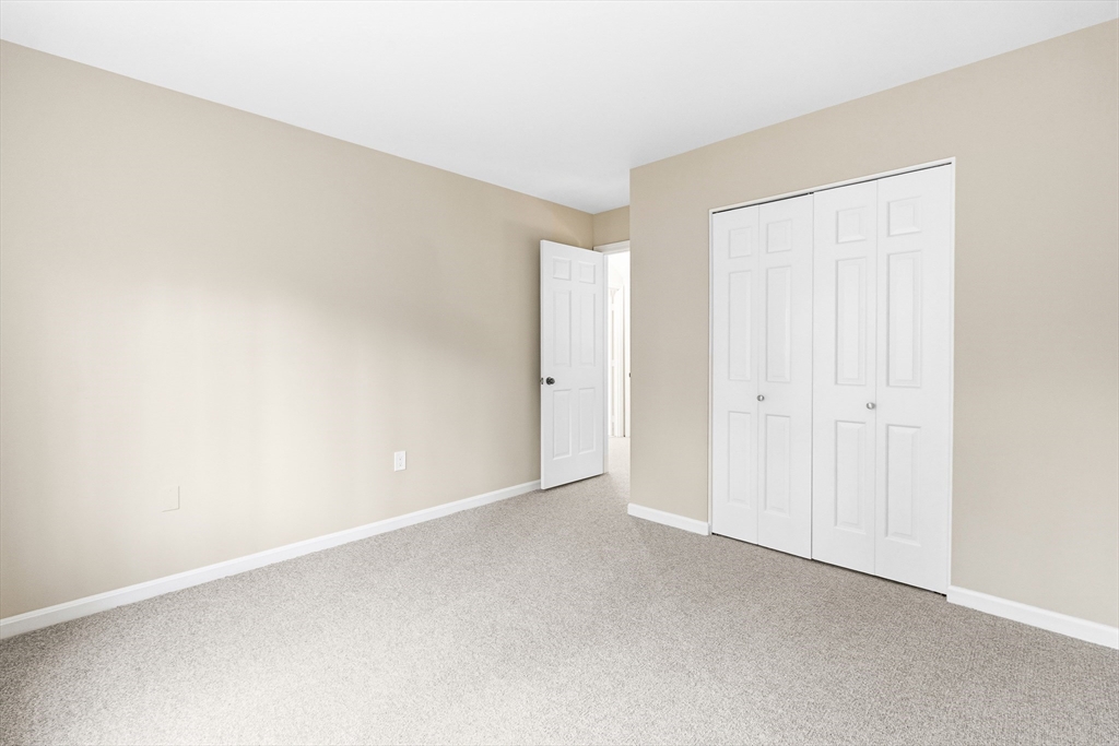 4 Drummer Boy Way, Unit 4 Lexington, MA 02420 - Photo 31 of 37 a view of an empty room