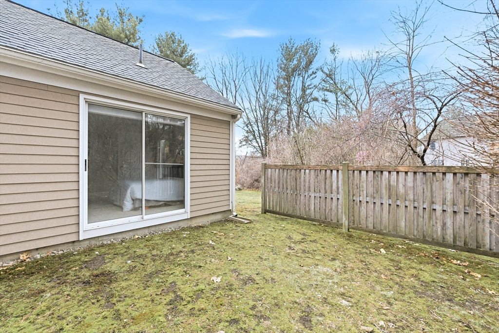 4 Drummer Boy Way, Unit 4 Lexington, MA 02420 - Photo 34 of 37 a view of a backyard