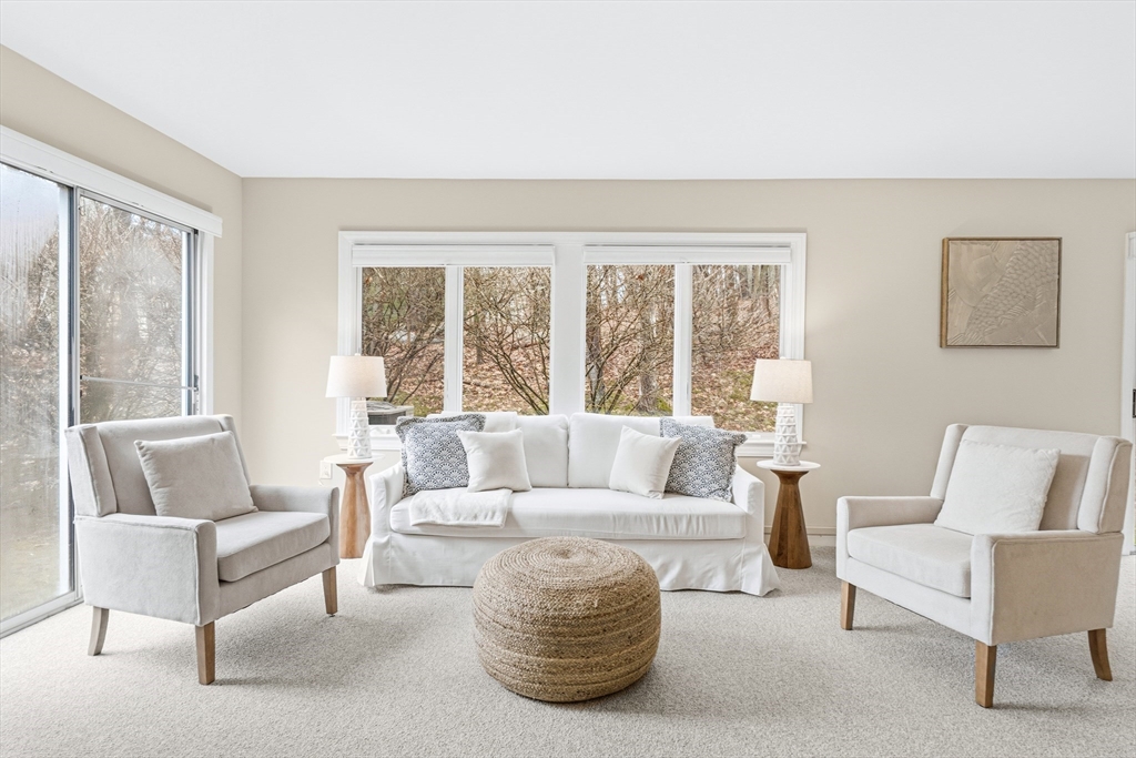 4 Drummer Boy Way, Unit 4 Lexington, MA 02420 - Photo 6 of 37 a living room with furniture and a large window