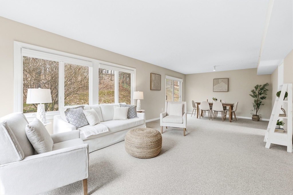 4 Drummer Boy Way, Unit 4 Lexington, MA 02420 - Photo 8 of 37 a living room with furniture and a large window