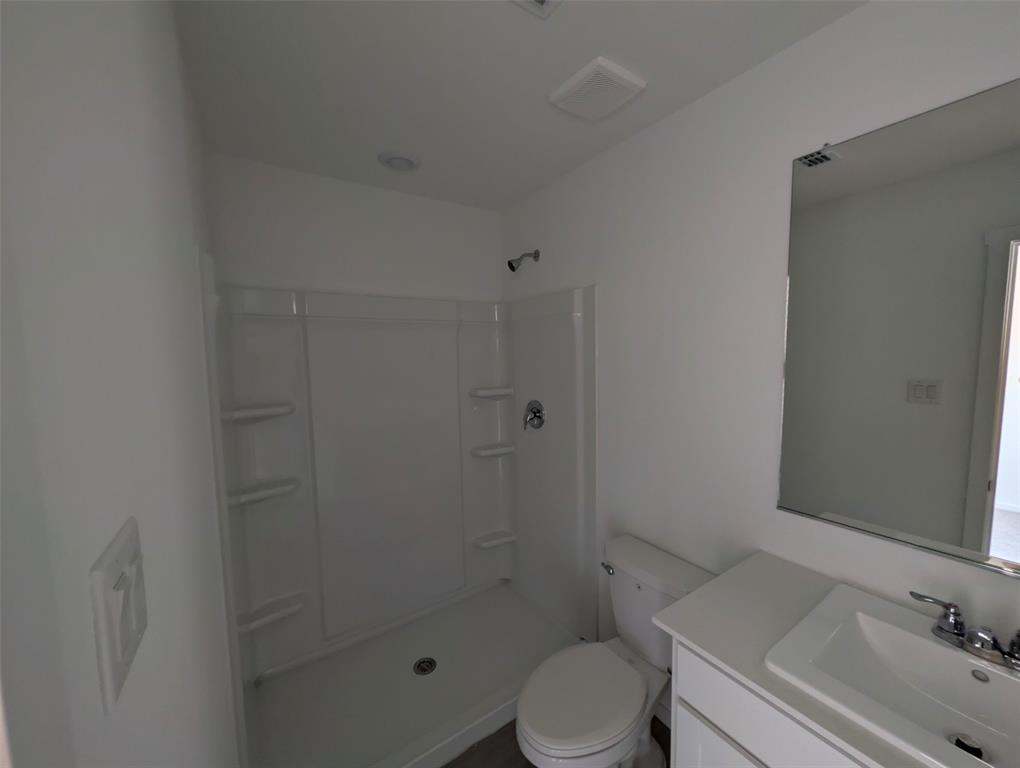 802 Sandhill Crane Lane Princeton, TX 75407 - Photo 12 of 18 a bathroom with a sink toilet and shower