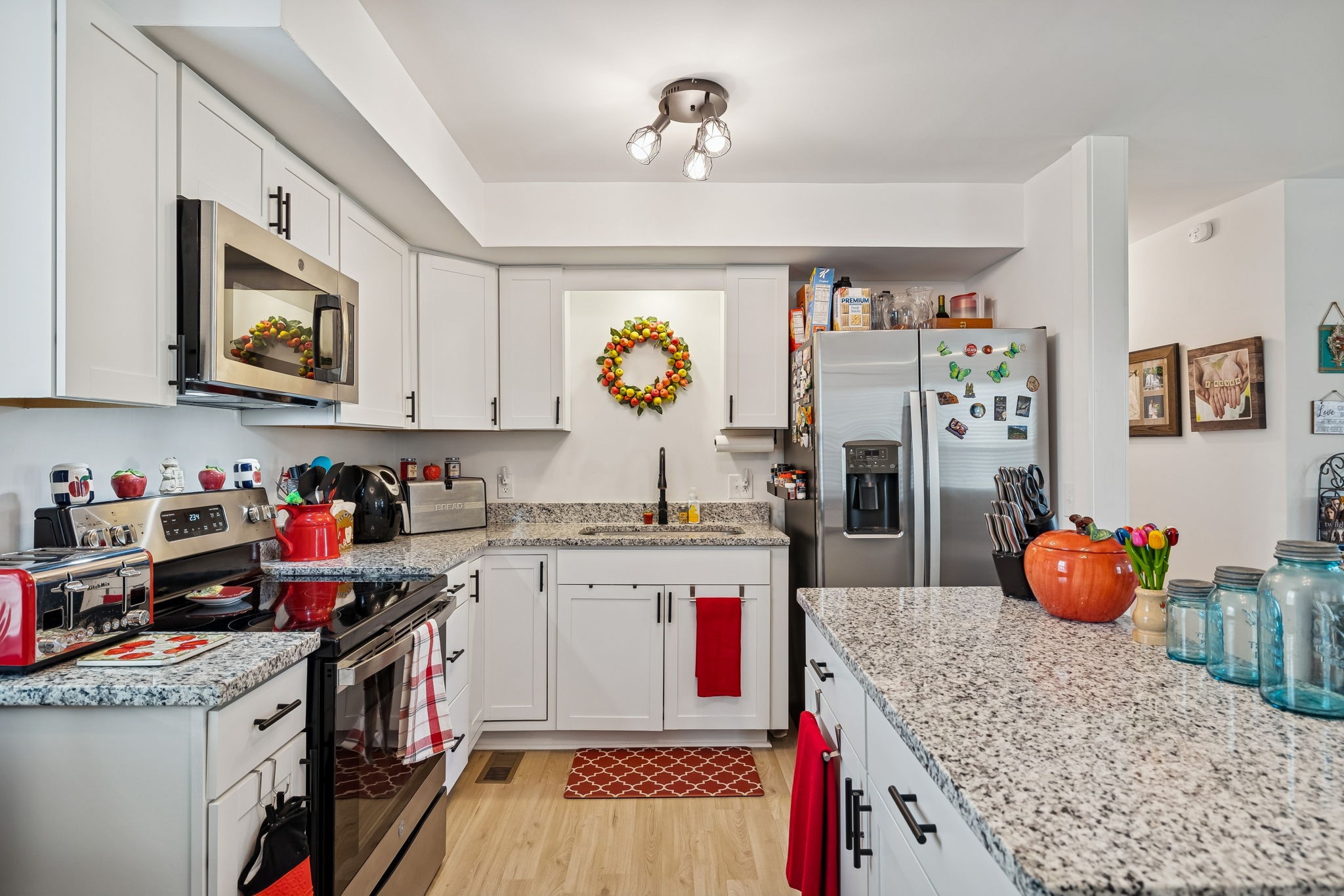 236 Commerce Avenue Watertown, TN 37184 - Photo 12 of 31 a kitchen with stainless steel appliances granite countertop a stove and cabinets