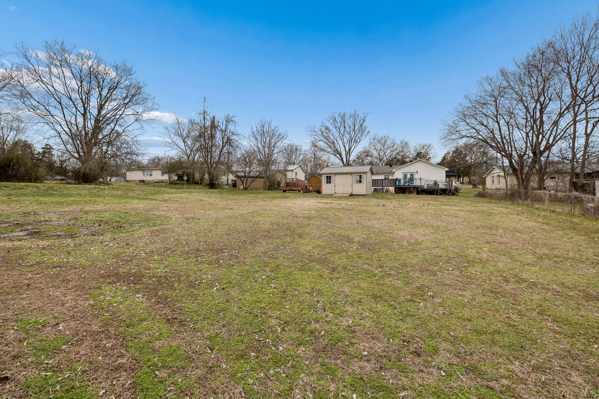 236 Commerce Avenue Watertown, TN 37184 - Photo 23 of 31 a view of a field with trees in the background