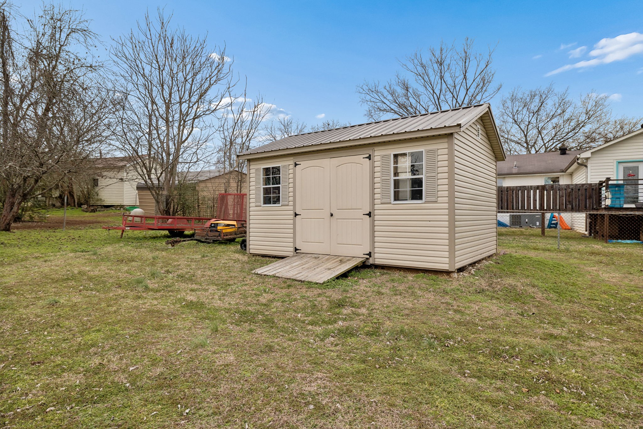 236 Commerce Avenue Watertown, TN 37184 - Photo 25 of 31 a view of a yard with a house