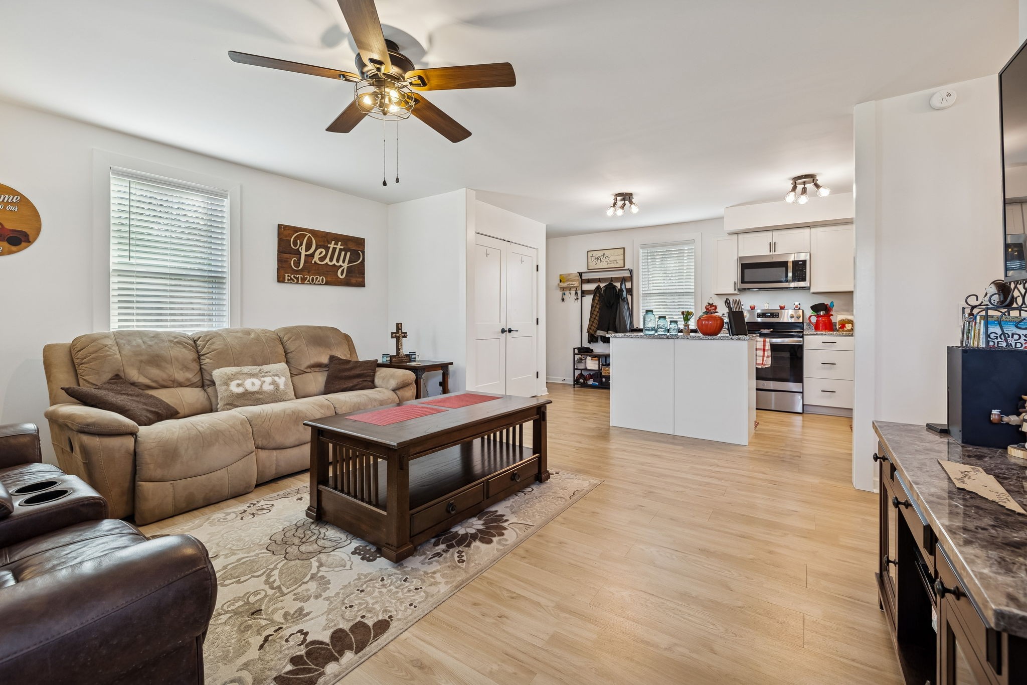 236 Commerce Avenue Watertown, TN 37184 - Photo 6 of 31 a living room with furniture and a flat screen tv