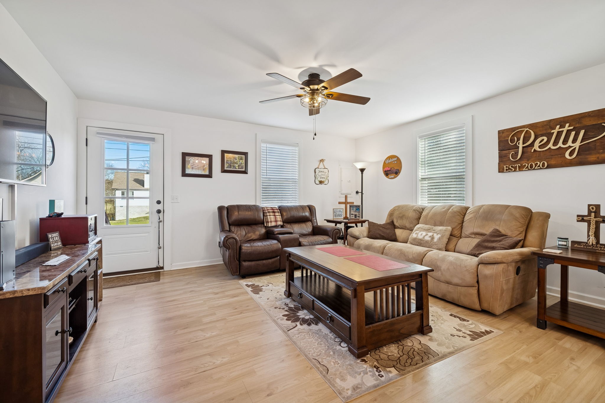 236 Commerce Avenue Watertown, TN 37184 - Photo 8 of 31 a living room with furniture and a flat screen tv