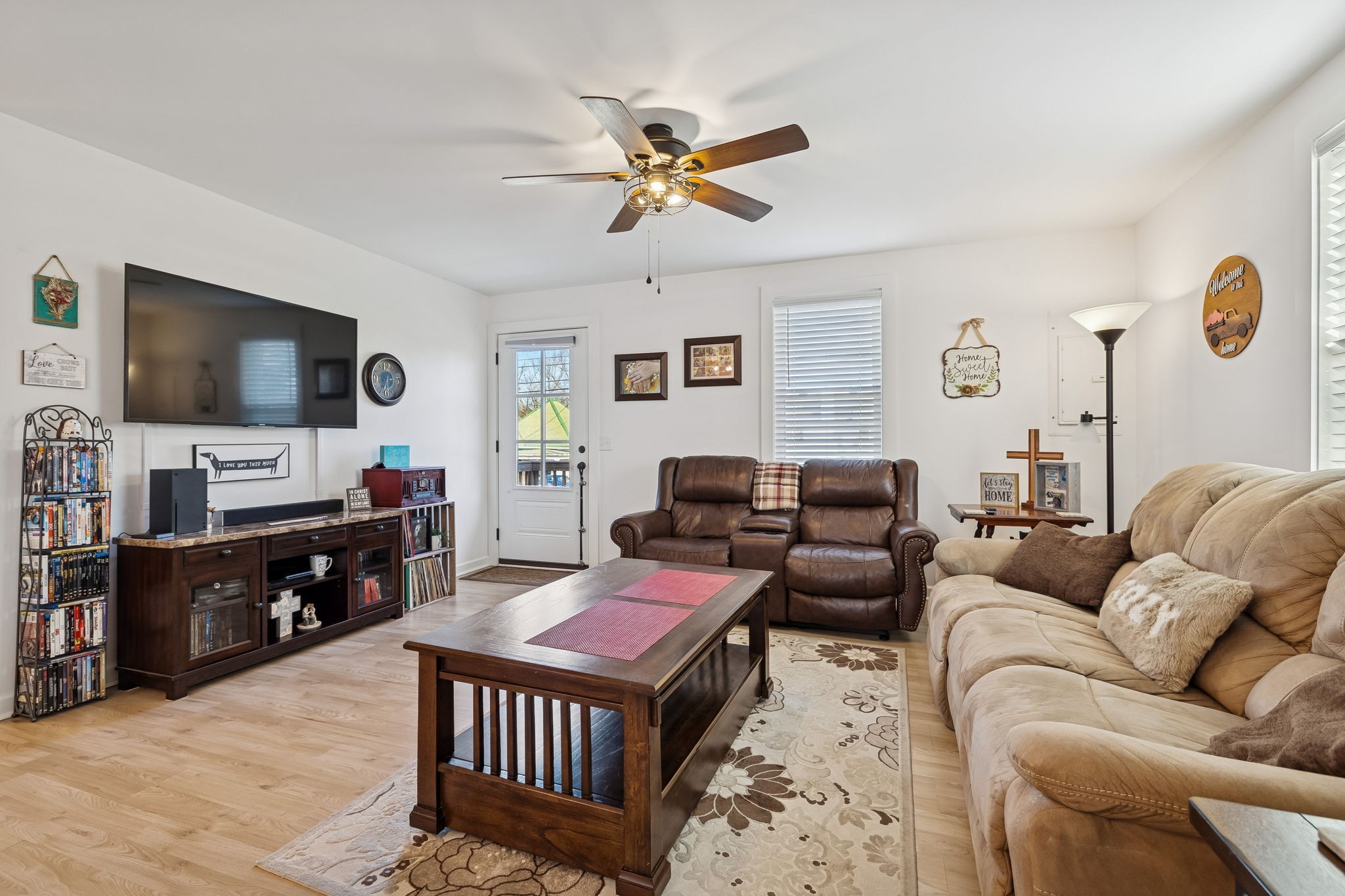236 Commerce Avenue Watertown, TN 37184 - Photo 9 of 31 a living room with furniture and a flat screen tv
