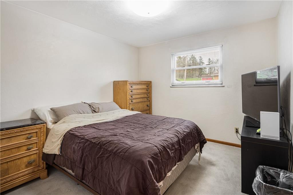 7 Josephine Street Slovan, PA 15078 - Photo 15 of 26 a bedroom with a bed and a window