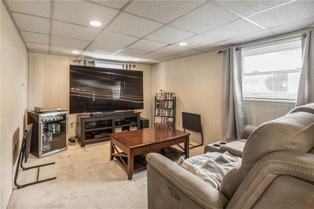 7 Josephine Street Slovan, PA 15078 - Photo 19 of 26 a living room with furniture and a flat screen tv