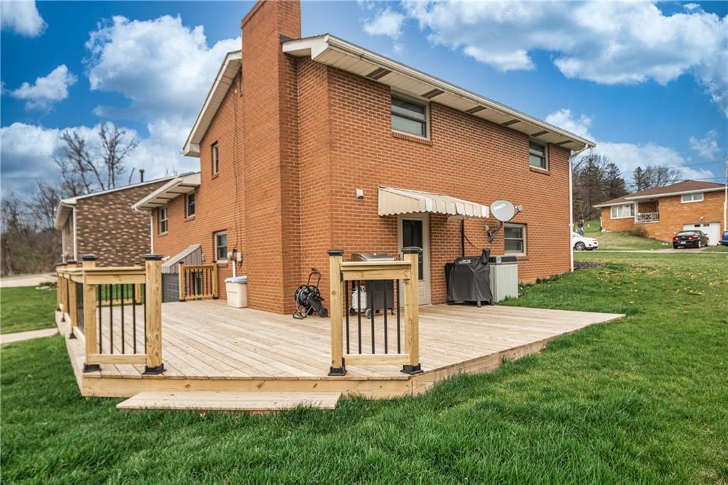 7 Josephine Street Slovan, PA 15078 - Photo 21 of 26 a front view of a house with a yard table and chairs