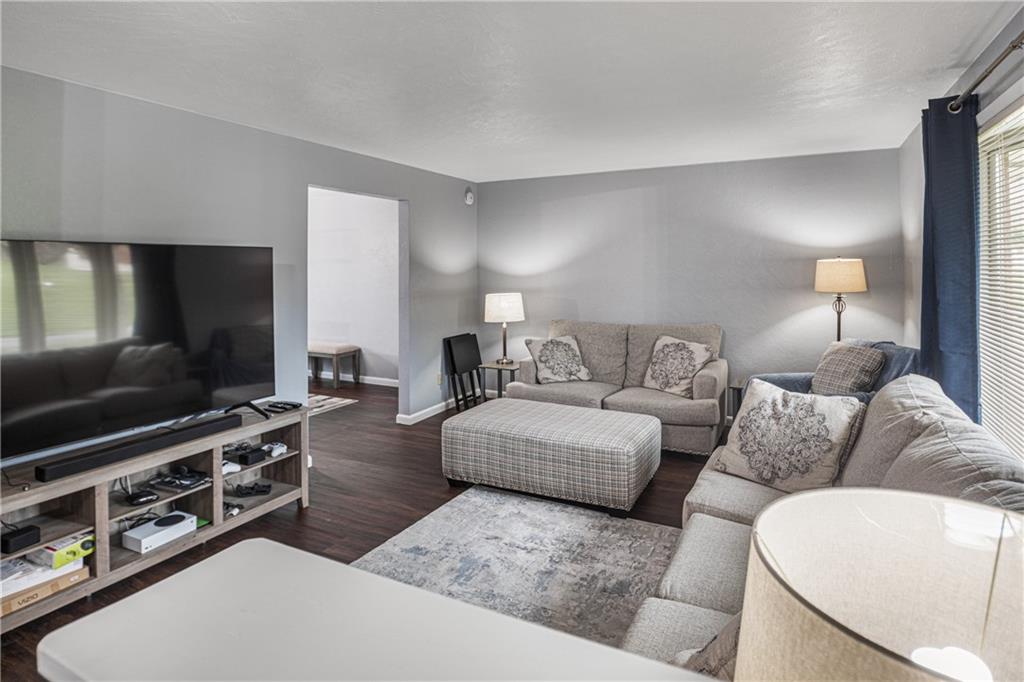 7 Josephine Street Slovan, PA 15078 - Photo 10 of 26 a living room with furniture and a flat screen tv