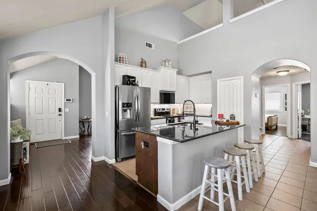 a view of a kitchen area with furniture and window