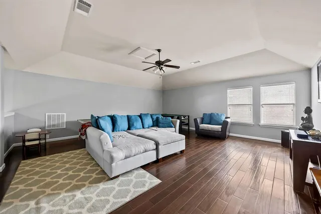 a view of a kitchen with dining table and chairs