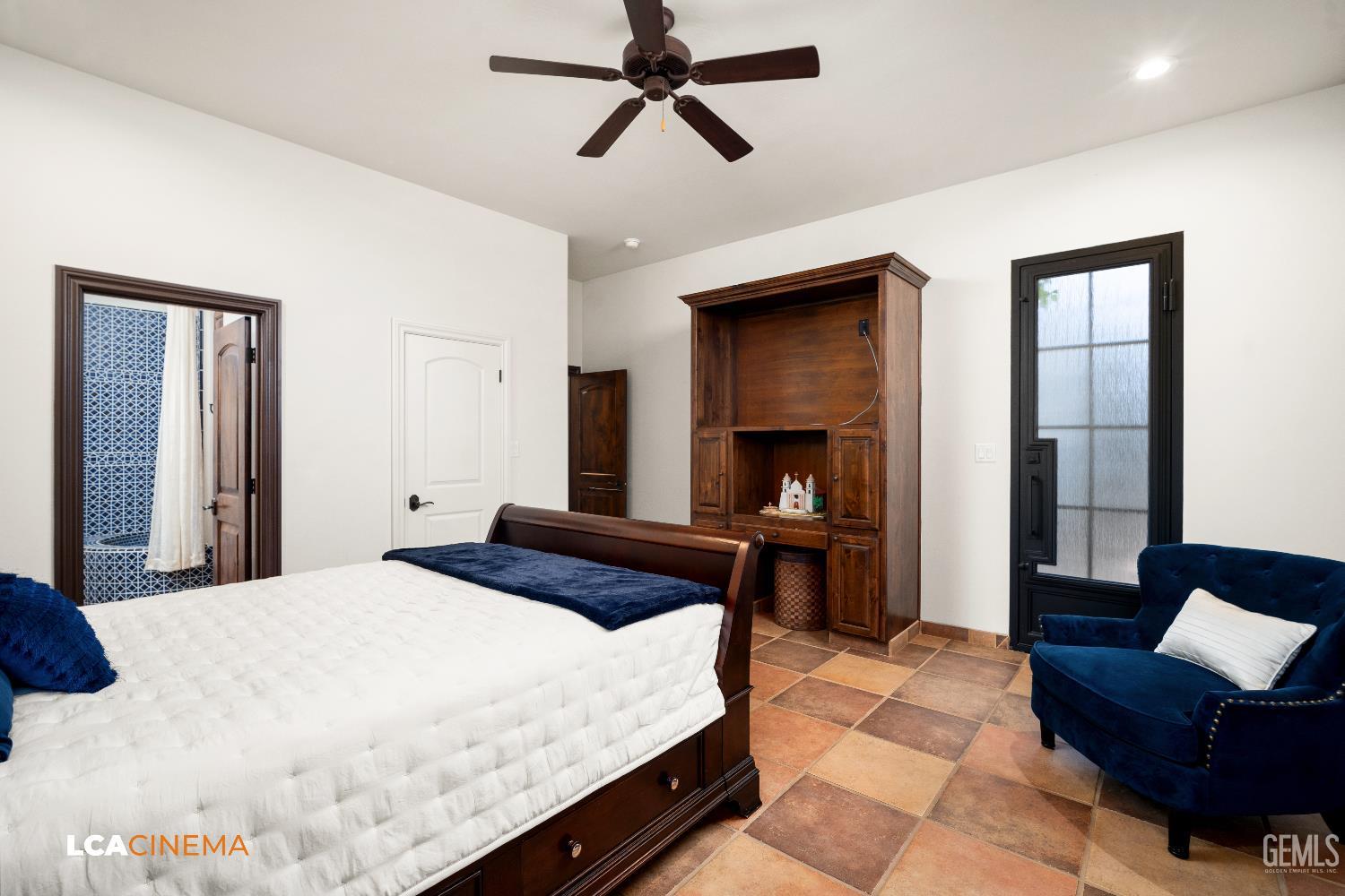 Undisclosed Address Bakersfield, CA 93306 - Photo 26 of 56 a bedroom with a bed and a couch