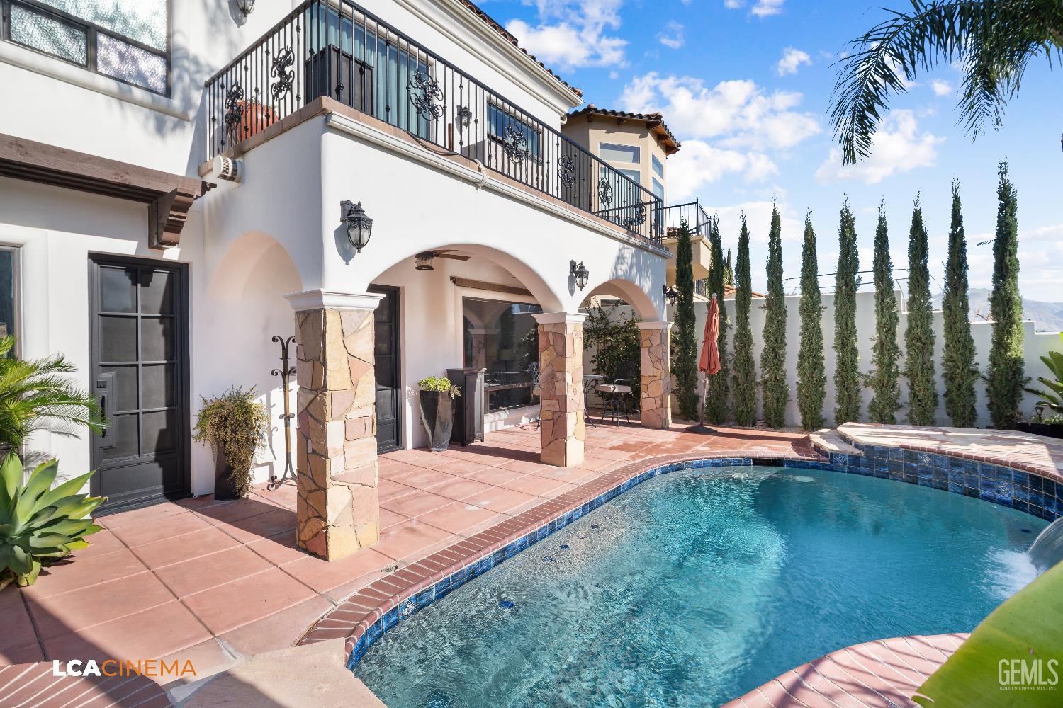 Undisclosed Address Bakersfield, CA 93306 - Photo 41 of 56 a view of a house with a swimming pool