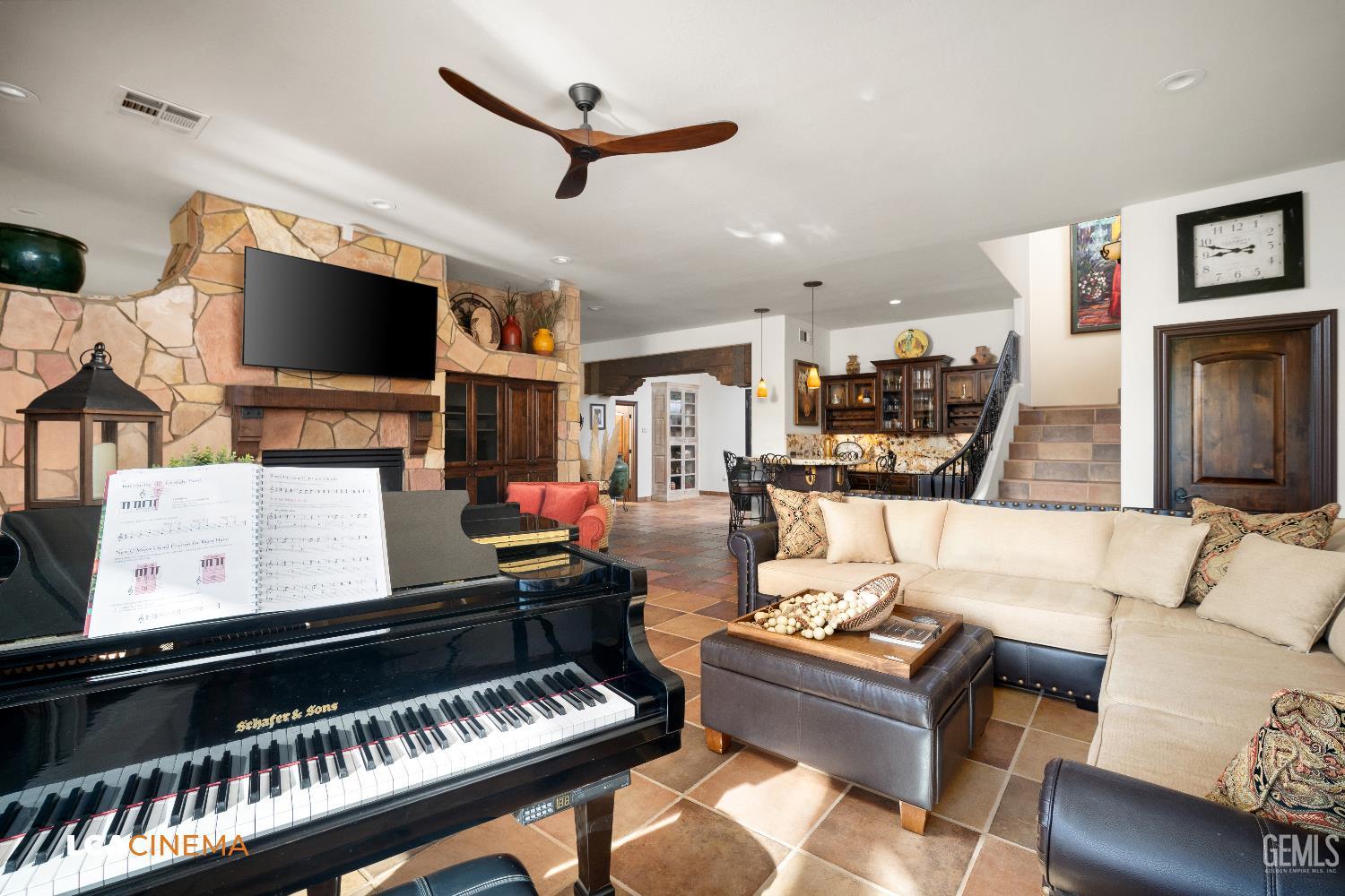 Undisclosed Address Bakersfield, CA 93306 - Photo 45 of 56 a living room with furniture and a flat screen tv