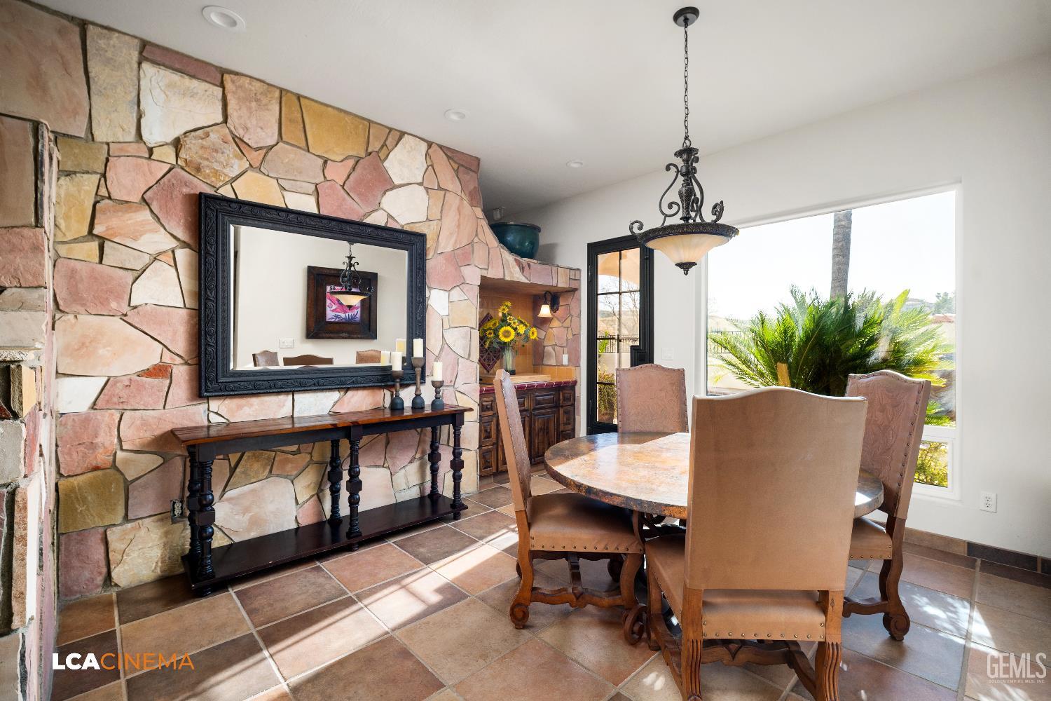 Undisclosed Address Bakersfield, CA 93306 - Photo 48 of 56 a view of a dining room with furniture window and wooden floor