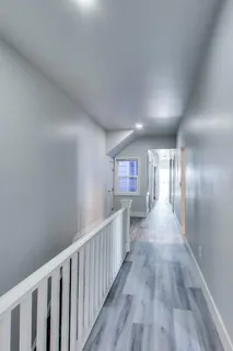 a bedroom with a bed and a table in it