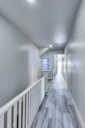 a bedroom with a bed and a table in it