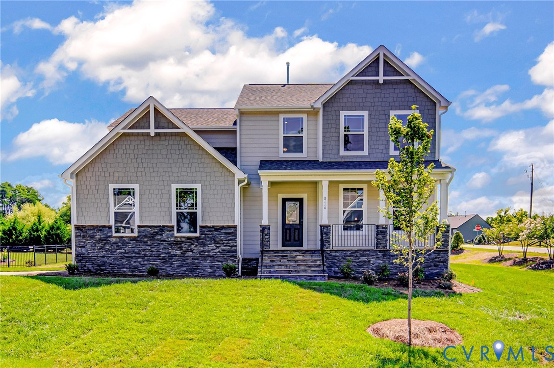 11366 Pinewild Drive Providence Forge, VA 23140 - Photo 1 of 22 a front view of a house with a yard