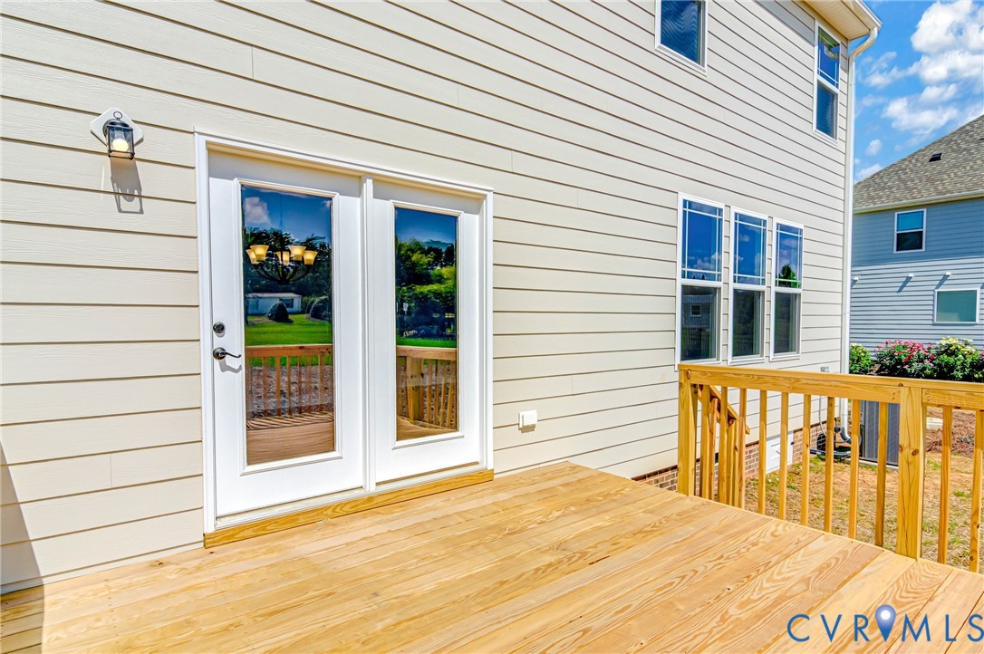 11366 Pinewild Drive Providence Forge, VA 23140 - Photo 17 of 22 a view of a house with a balcony