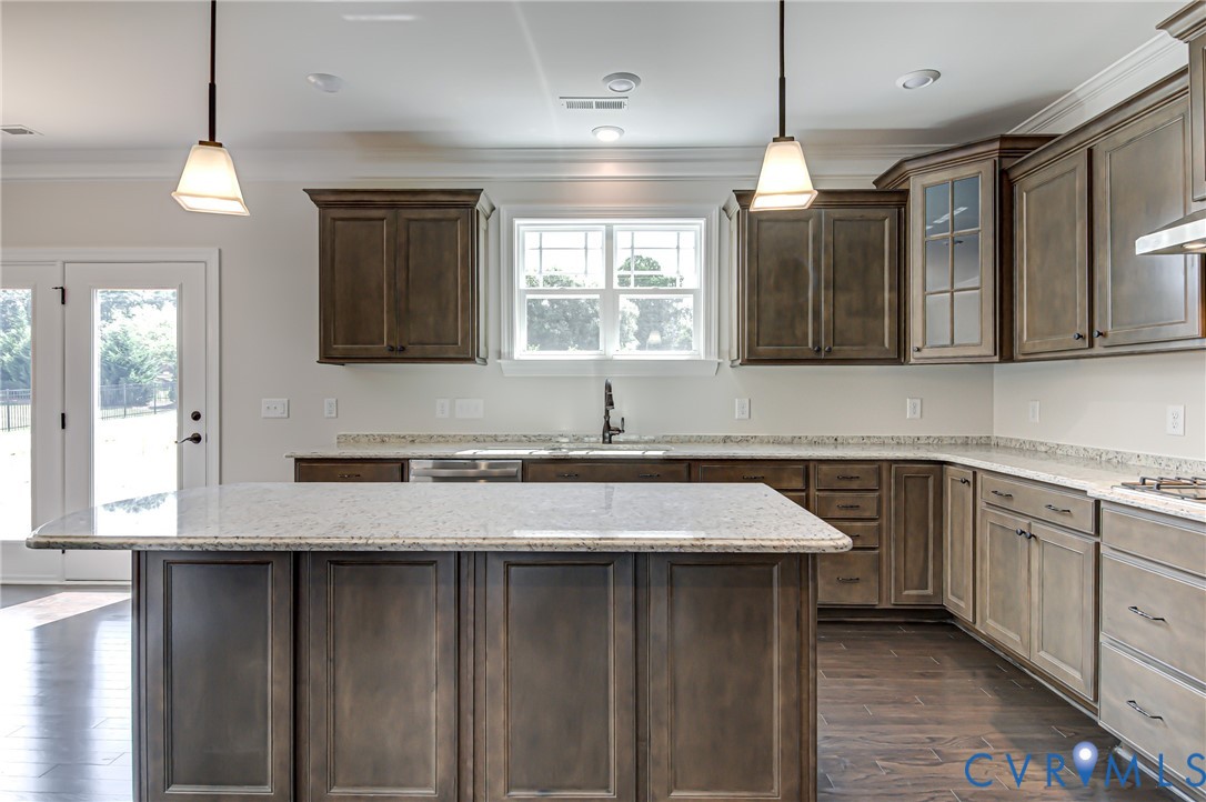 11366 Pinewild Drive Providence Forge, VA 23140 - Photo 4 of 22 a kitchen with a sink cabinets and window