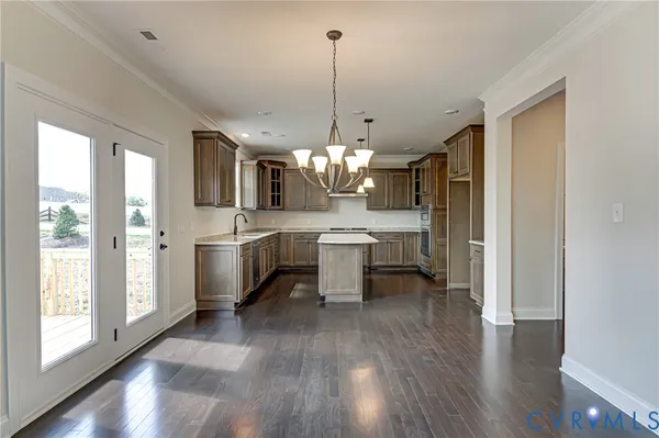 a view of a kitchen and dining room