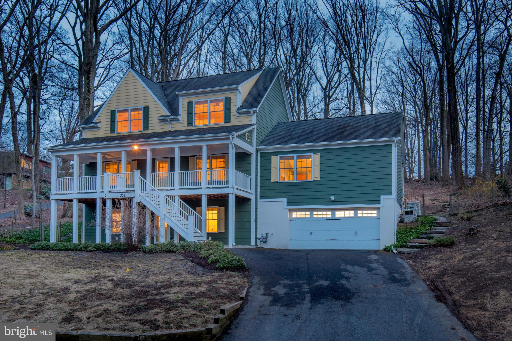 a front view of building with tree s