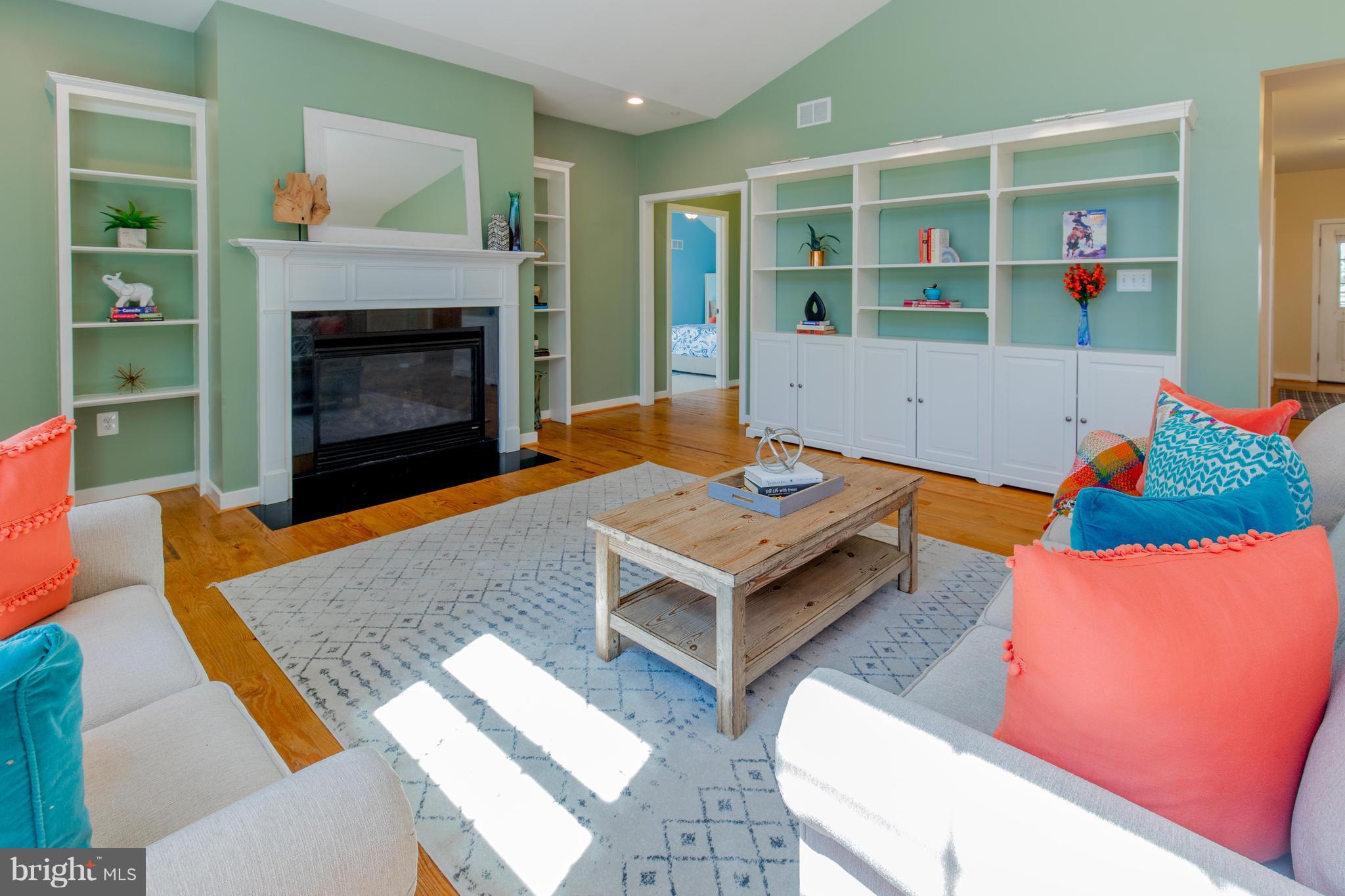309 Willington Drive Silver Spring, MD 20904 - Photo 11 of 30 a living room with furniture and a fireplace
