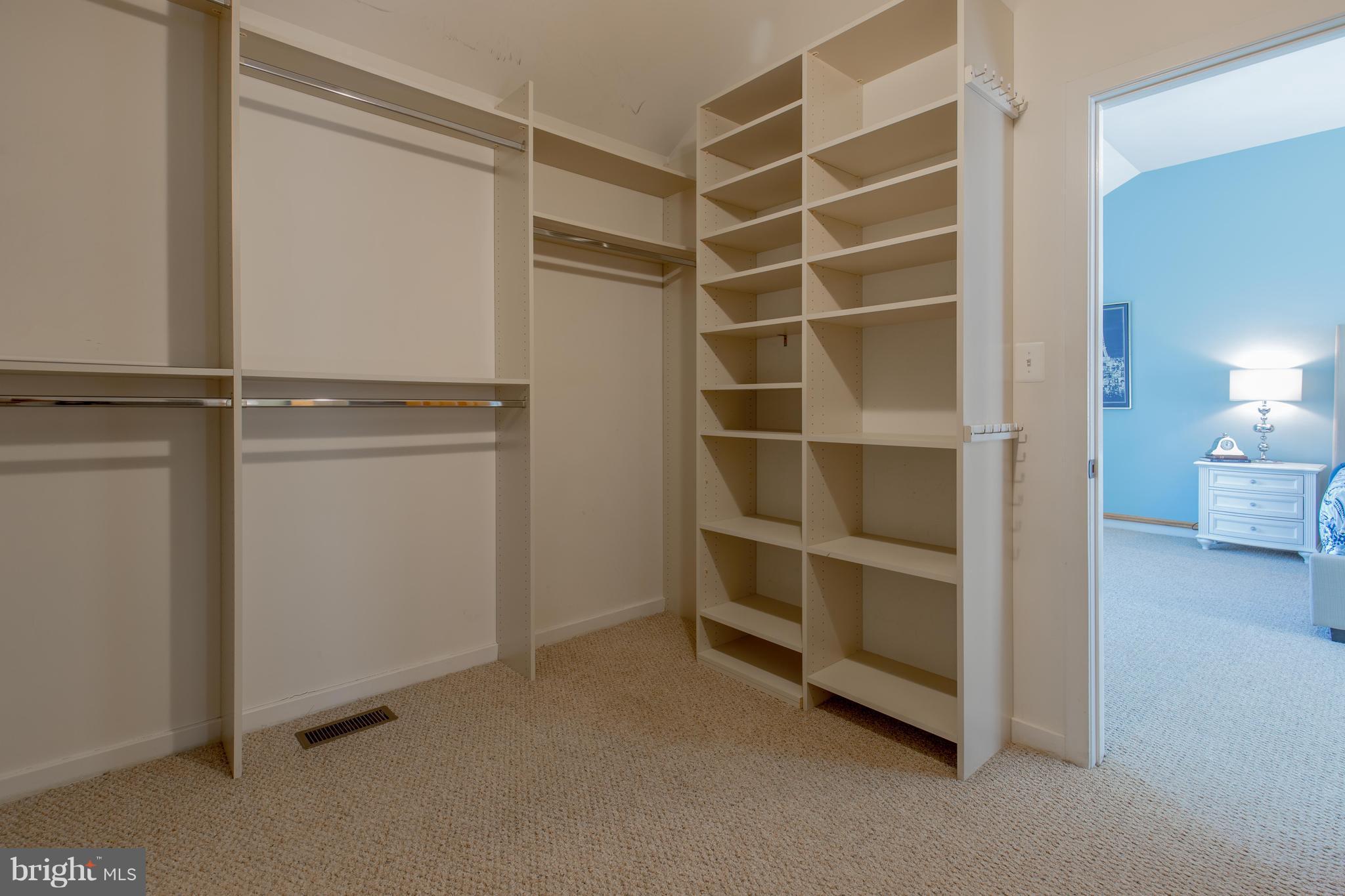 309 Willington Drive Silver Spring, MD 20904 - Photo 16 of 30 a view of an empty room with empty shelves