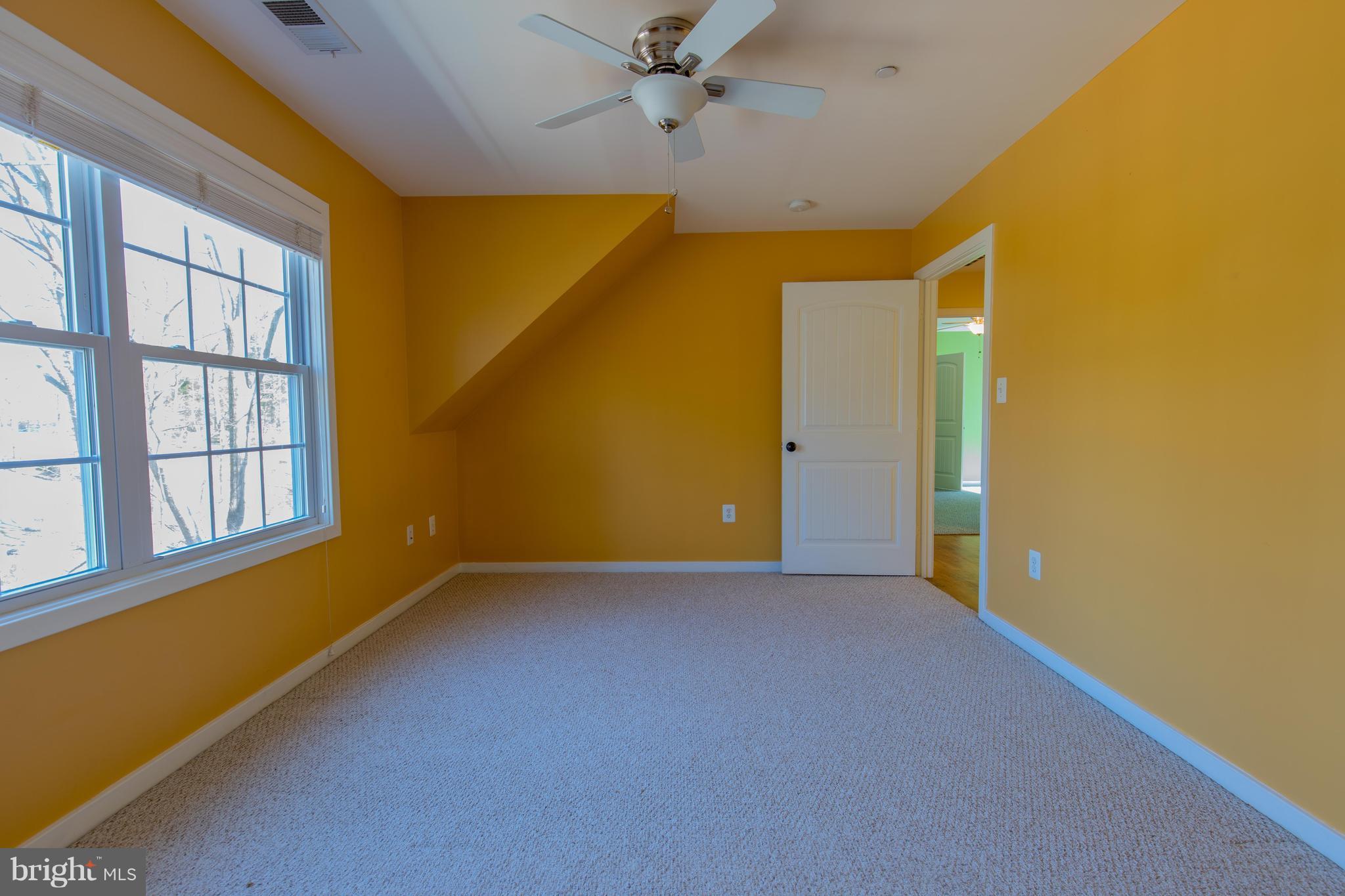 309 Willington Drive Silver Spring, MD 20904 - Photo 18 of 30 a view of an empty room with a window