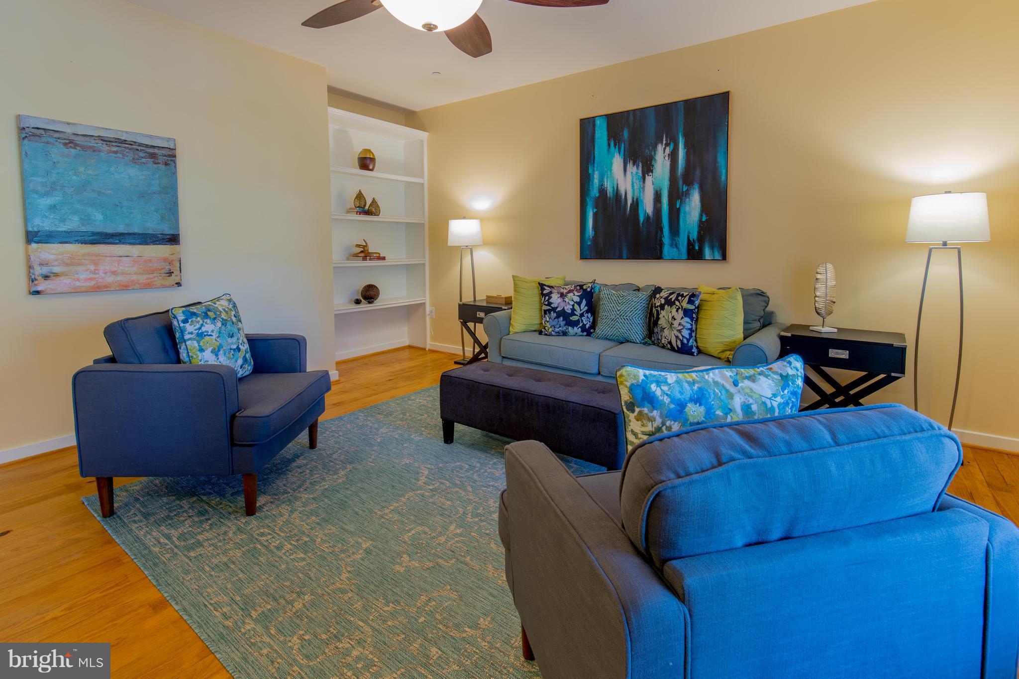 309 Willington Drive Silver Spring, MD 20904 - Photo 3 of 30 a living room with furniture and a lamp