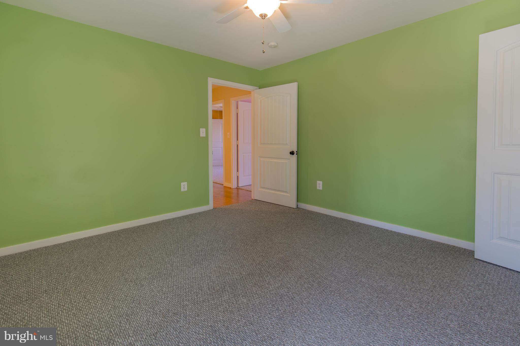 309 Willington Drive Silver Spring, MD 20904 - Photo 23 of 30 a view of an empty room with a window