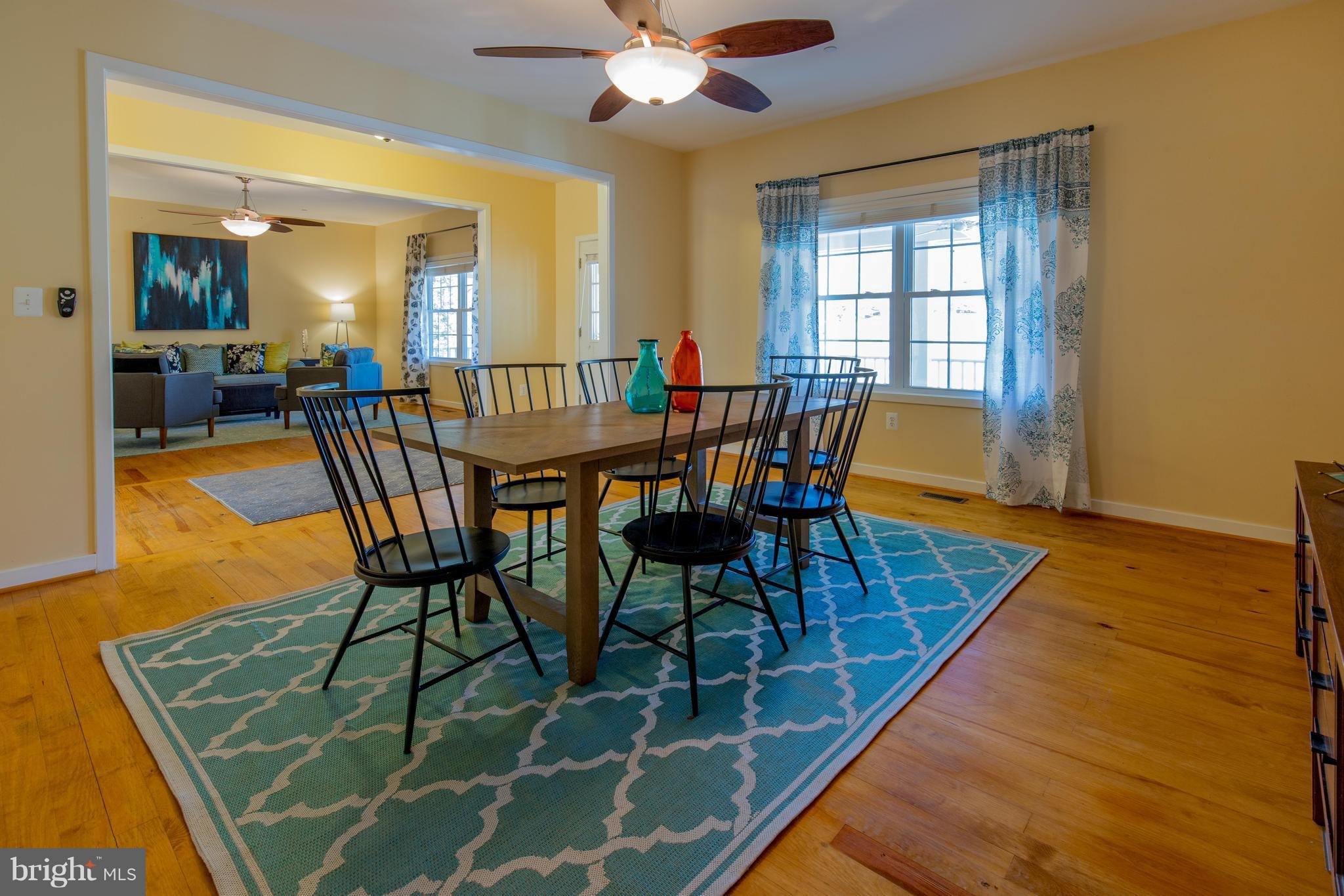 309 Willington Drive Silver Spring, MD 20904 - Photo 6 of 30 a view of a dining room with furniture and wooden floor