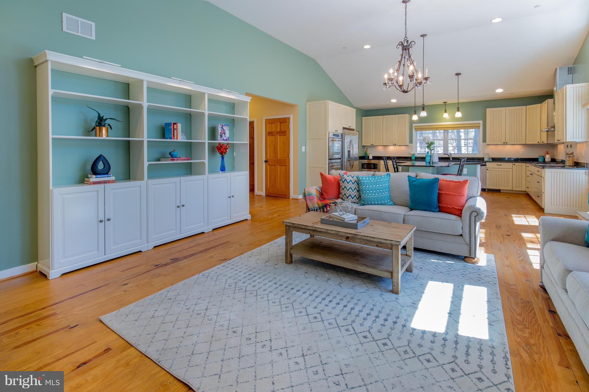 309 Willington Drive Silver Spring, MD 20904 - Photo 10 of 30 a living room with furniture and kitchen view