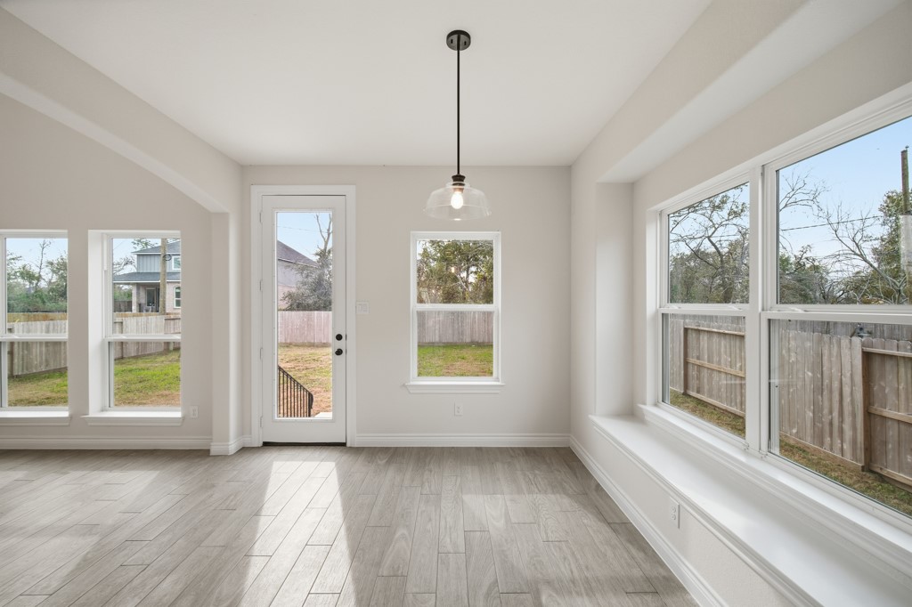 16507 Boston Post Road Cypress, TX 77429 - Photo 12 of 39 Sunlight fills the room, creating a bright and inviting atmosphere.