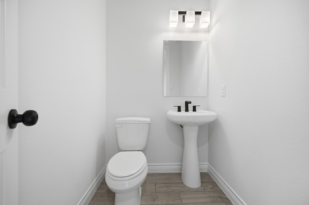 16507 Boston Post Road Cypress, TX 77429 - Photo 15 of 39 The powder bath is located on the first floor.