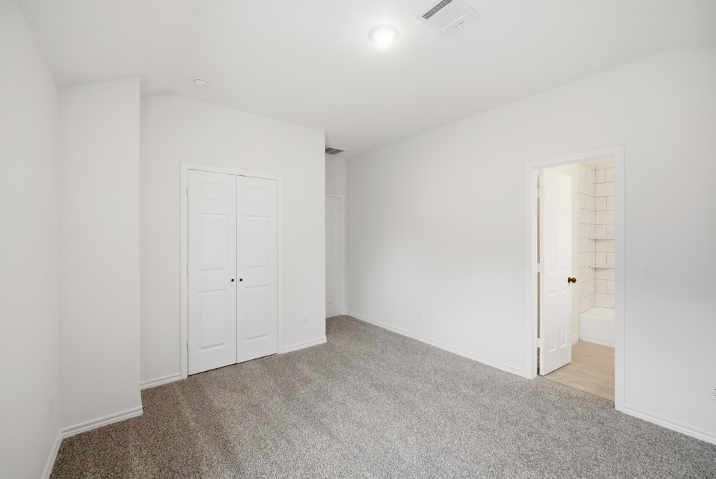 16507 Boston Post Road Cypress, TX 77429 - Photo 28 of 39 This bedroom includes a dedicated en suite bathroom.
