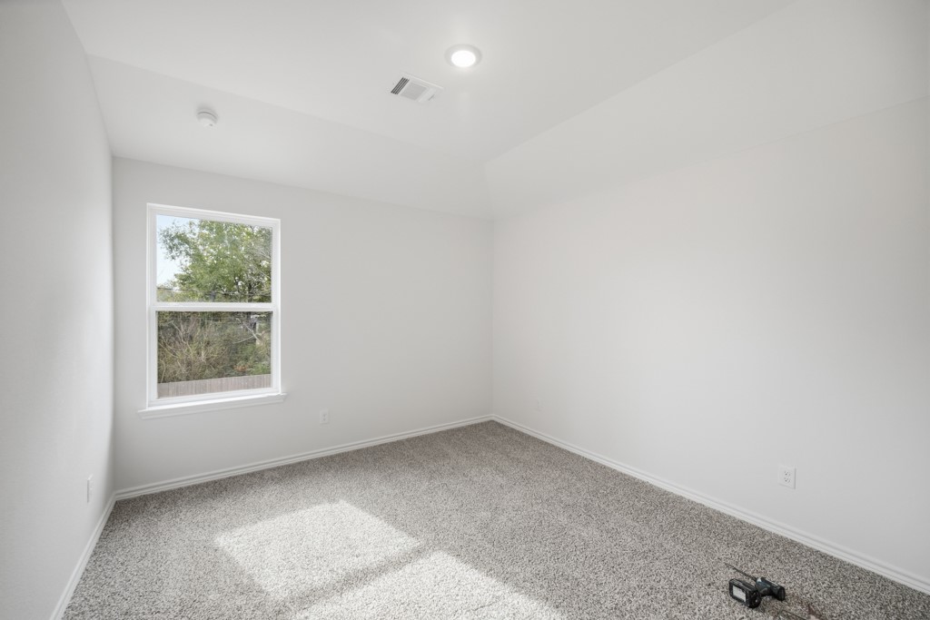 16507 Boston Post Road Cypress, TX 77429 - Photo 31 of 39 Two of three upstairs secondary with plush carpet.