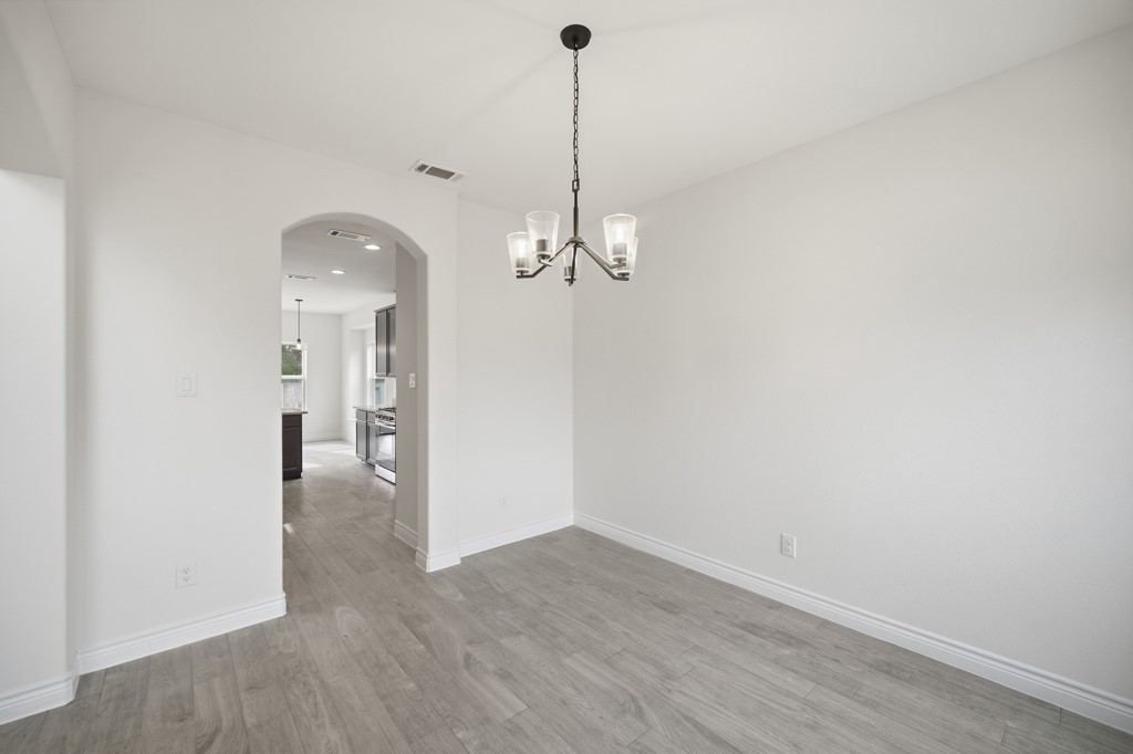 16507 Boston Post Road Cypress, TX 77429 - Photo 4 of 39 The dining room, located just off the entry and adjacent to the kitchen, makes entertaining family and friends effortless.
