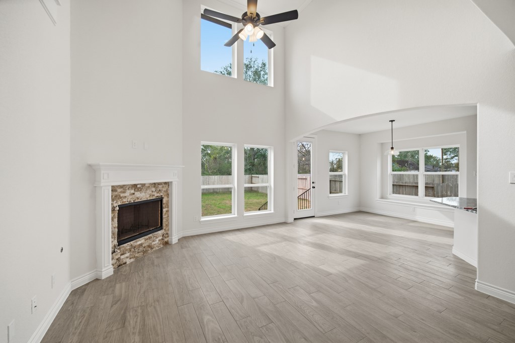 16507 Boston Post Road Cypress, TX 77429 - Photo 7 of 39 The family room opens to the kitchen and breakfast space, perfect for family gatherings.