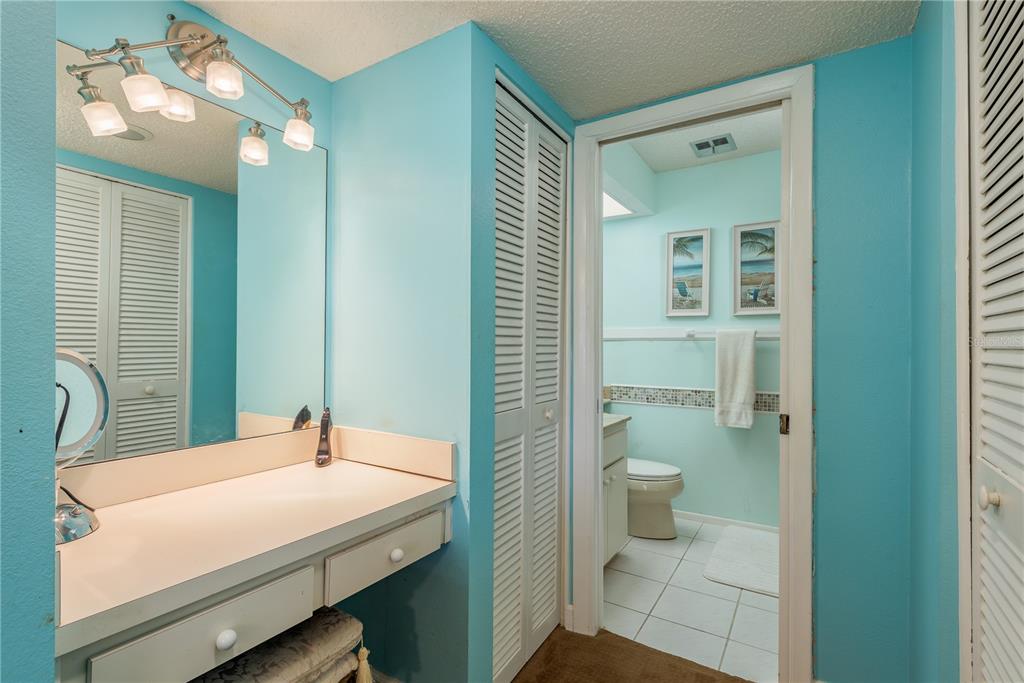 11241 Dollar Lake Drive, Unit 5 Port Richey, FL 34668 - Photo 18 of 49 a bathroom with a sink a toilet and shower
