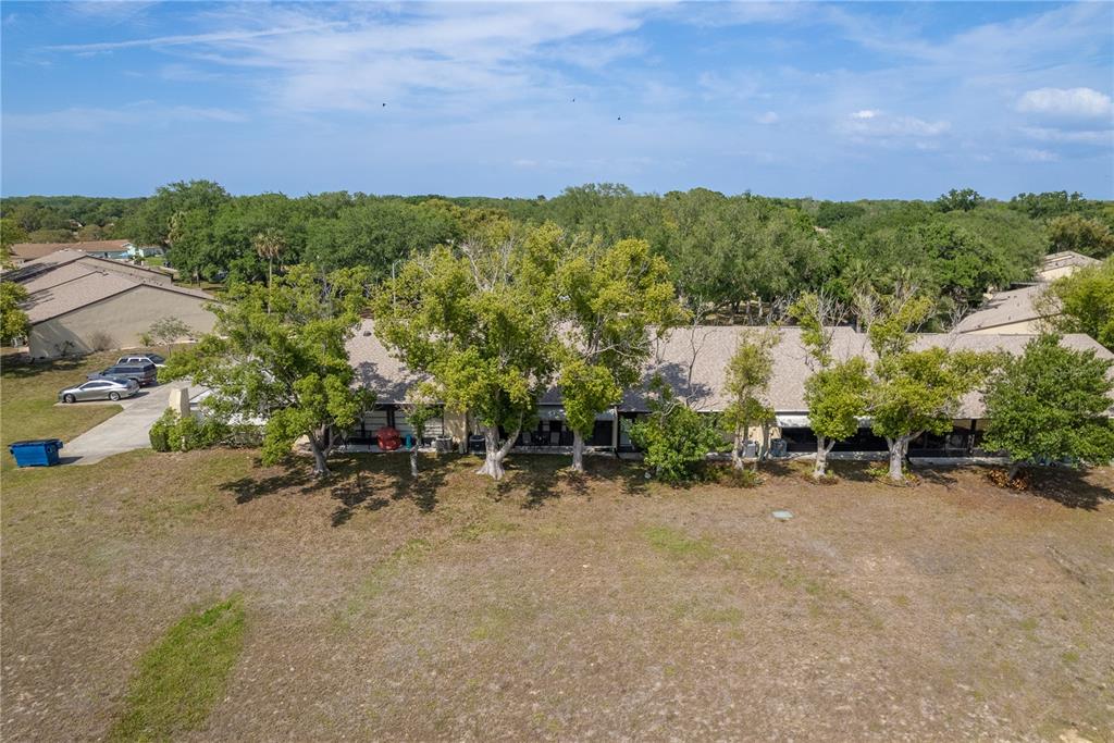11241 Dollar Lake Drive, Unit 5 Port Richey, FL 34668 - Photo 33 of 49 an aerial view of multiple house