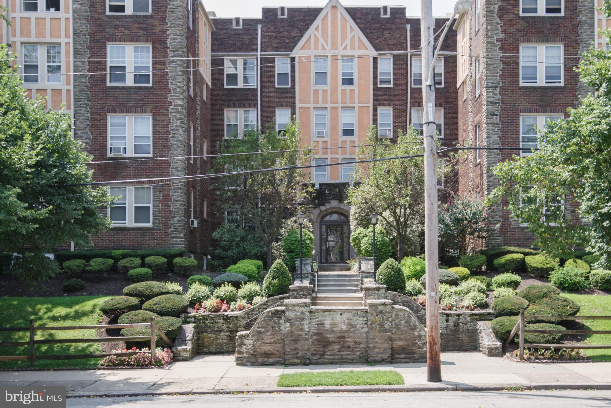 a front view of a multi story residential apartment building