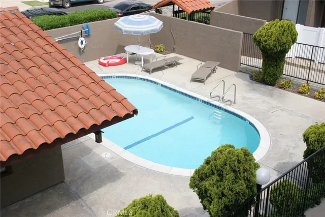 a view of a chairs and table in the patio