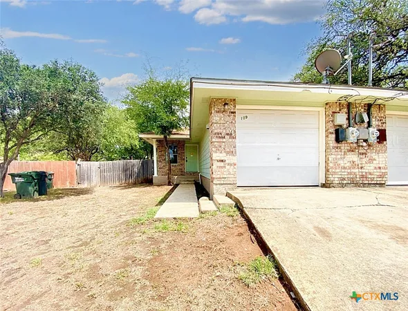 a house with trees in front of it