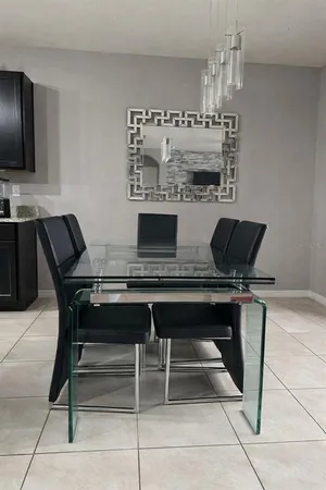 a view of a dining room with furniture