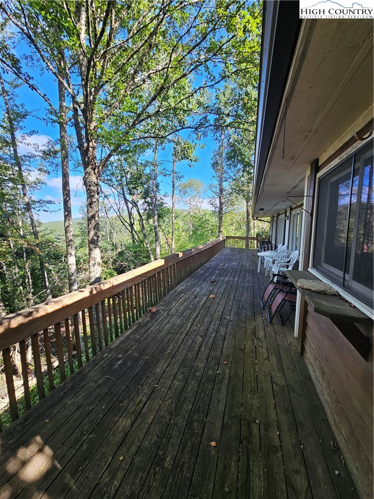 109 Foxgrape Hollow Road Beech Mountain, NC 28604 - Photo 32 of 50 a view of balcony with wooden floor and outdoor space